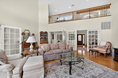 Welcome to this immaculate 4-bedroom LAKEFRONT home in the - photo 9