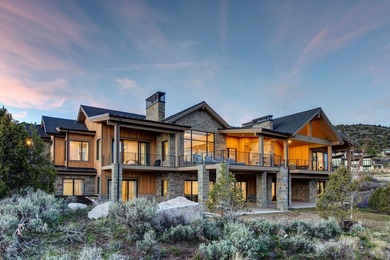 Positioned on 1.62 acres, 2566 E Boulder Top Way is an - photo 1