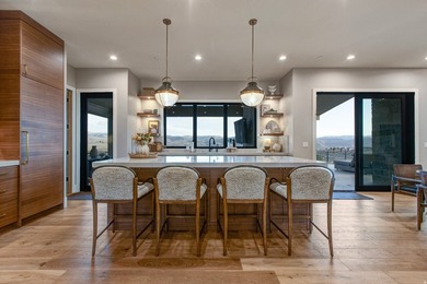 Positioned on 1.62 acres, 2566 E Boulder Top Way is an - photo 4