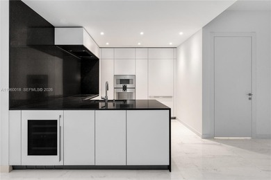 Experience refined waterfront living in the iconic Aston Martin