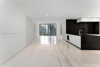 Experience refined waterfront living in the iconic Aston Martin