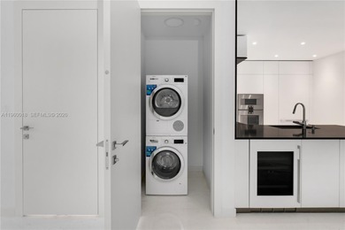 Experience refined waterfront living in the iconic Aston Martin