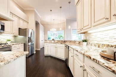Welcome to this impressive pool home in North Bay, an - photo 32