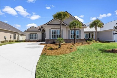 Marshfront Retreat in gated Fiddler's Cove, this home offers - photo 2
