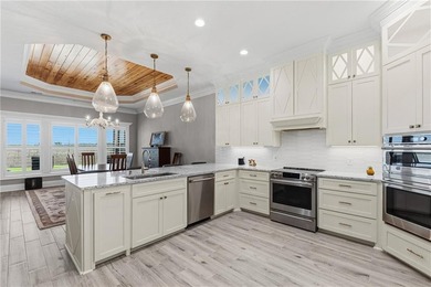 Marshfront Retreat in gated Fiddler's Cove, this home offers - photo 5