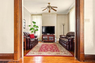 Step into timeless charm with this spacious 5-bedroom home that