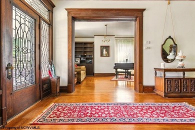 Step into timeless charm with this spacious 5-bedroom home that