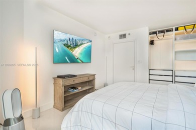 Designer-renovated 2BD + den / 2BA corner residence offering 1