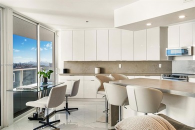 Designer-renovated 2BD + den / 2BA corner residence offering 1