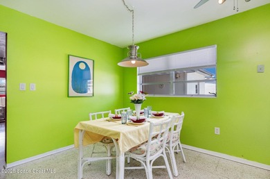 Bright & Cheery Retro Beach Home! You'll fall in love with this - photo 4