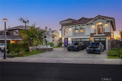 Set in Coral Cay - Huntington Harbour's most coveted 24-hour - photo 1