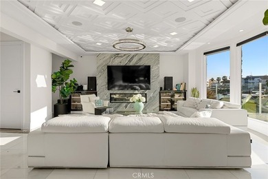 Set in Coral Cay - Huntington Harbour's most coveted 24-hour - photo 3