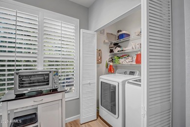 This well-maintained condo offers a bright, functional layout