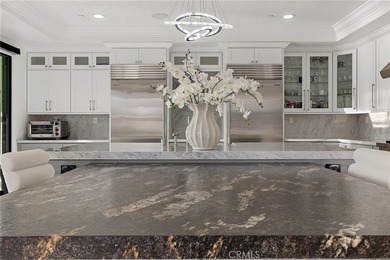 Set in Coral Cay - Huntington Harbour's most coveted 24-hour - photo 6