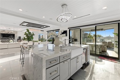 Set in Coral Cay - Huntington Harbour's most coveted 24-hour - photo 9