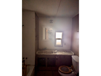 This mobile home sits on a spacious lot near the end of a - photo 7