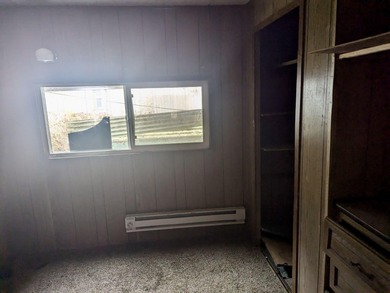 This mobile home sits on a spacious lot near the end of a - photo 8
