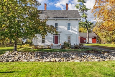 Set gracefully on 1.55 acres and positioned back from the road - photo 1