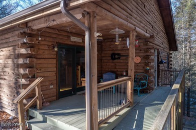 Privately set log home offering total privacy and backing to