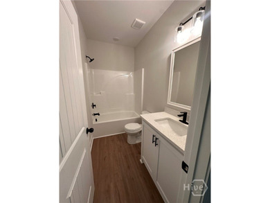 Brand-new 3-bedroom, 2-bath home offering 1,525 heated sqft in - photo 6