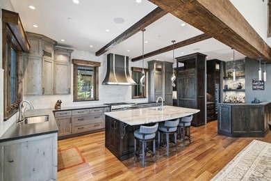 A striking blend of modern mountain architecture and refined - photo 8