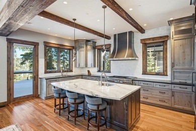A striking blend of modern mountain architecture and refined - photo 9