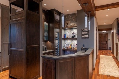 A striking blend of modern mountain architecture and refined - photo 10