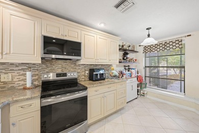 Bright and spacious coach home with stunning long lake views - photo 11
