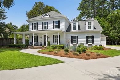 Welcome to this beautiful 5-bedroom home tucked away on a quiet - photo 1