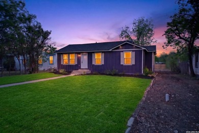 This charming fully renovated home nestled in an established - photo 3