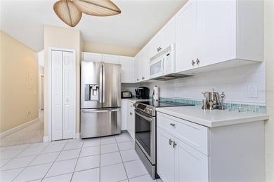 Rarely available first floor marina front condo. Located in - photo 19