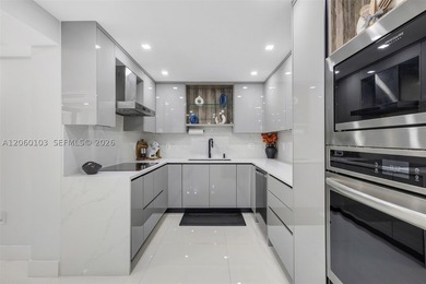 Step off the elevator on the second floor and into a home that - photo 3