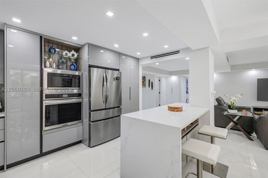Step off the elevator on the second floor and into a home that - photo 4