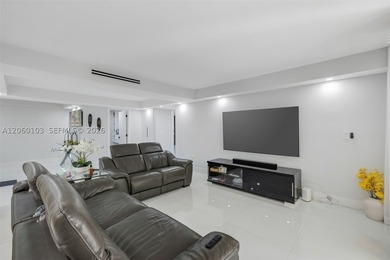 Step off the elevator on the second floor and into a home that - photo 7
