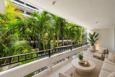 Step off the elevator on the second floor and into a home that - photo 8