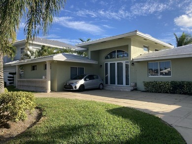This wonderful single story waterfront home with 80 feet of - photo 1