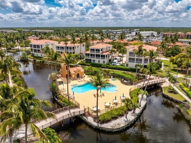 Rarely available first floor marina front condo. Located in - photo 54
