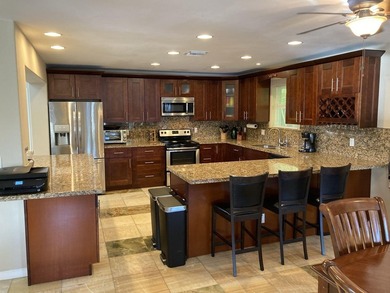 This wonderful single story waterfront home with 80 feet of - photo 9