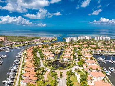 Rarely available first floor marina front condo. Located in - photo 60
