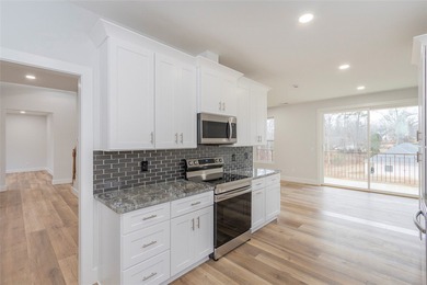 Brand new construction in Top Sail Bay subdivision featuring - photo 13