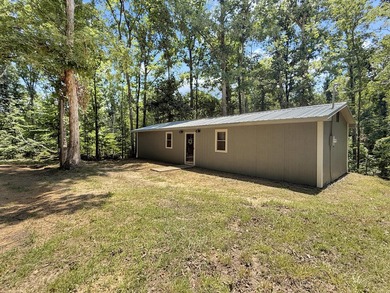 SECLUDED! Tucked away on 1.75 wooded acres, this cute 3-bedroom - photo 14
