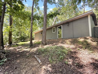 SECLUDED! Tucked away on 1.75 wooded acres, this cute 3-bedroom - photo 15