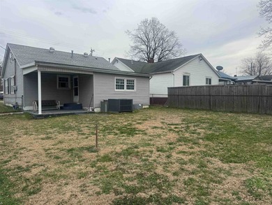 Charming one-level home in Henderson situated on a deep corner