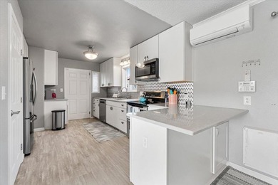 Just a short walk to the ocean, this 5-bedroom, 2-bath home - photo 6
