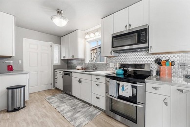 Just a short walk to the ocean, this 5-bedroom, 2-bath home - photo 7