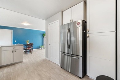 Just a short walk to the ocean, this 5-bedroom, 2-bath home - photo 8