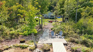 This beautifully maintained 2-bedroom, 2-bath lakefront home - photo 3