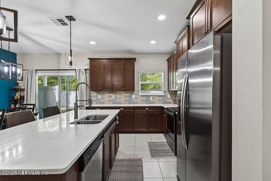 Welcome home to low-maintenance living in the desirable Wells - photo 11