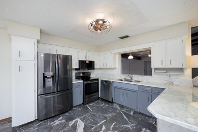 Beautiful three-bedroom, two bath home located in a charming - photo 11