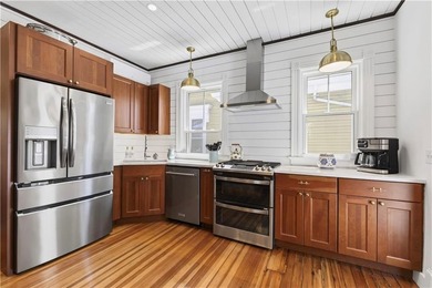 Finest turnkey living. This classic Victorian cottage, painted a - photo 13